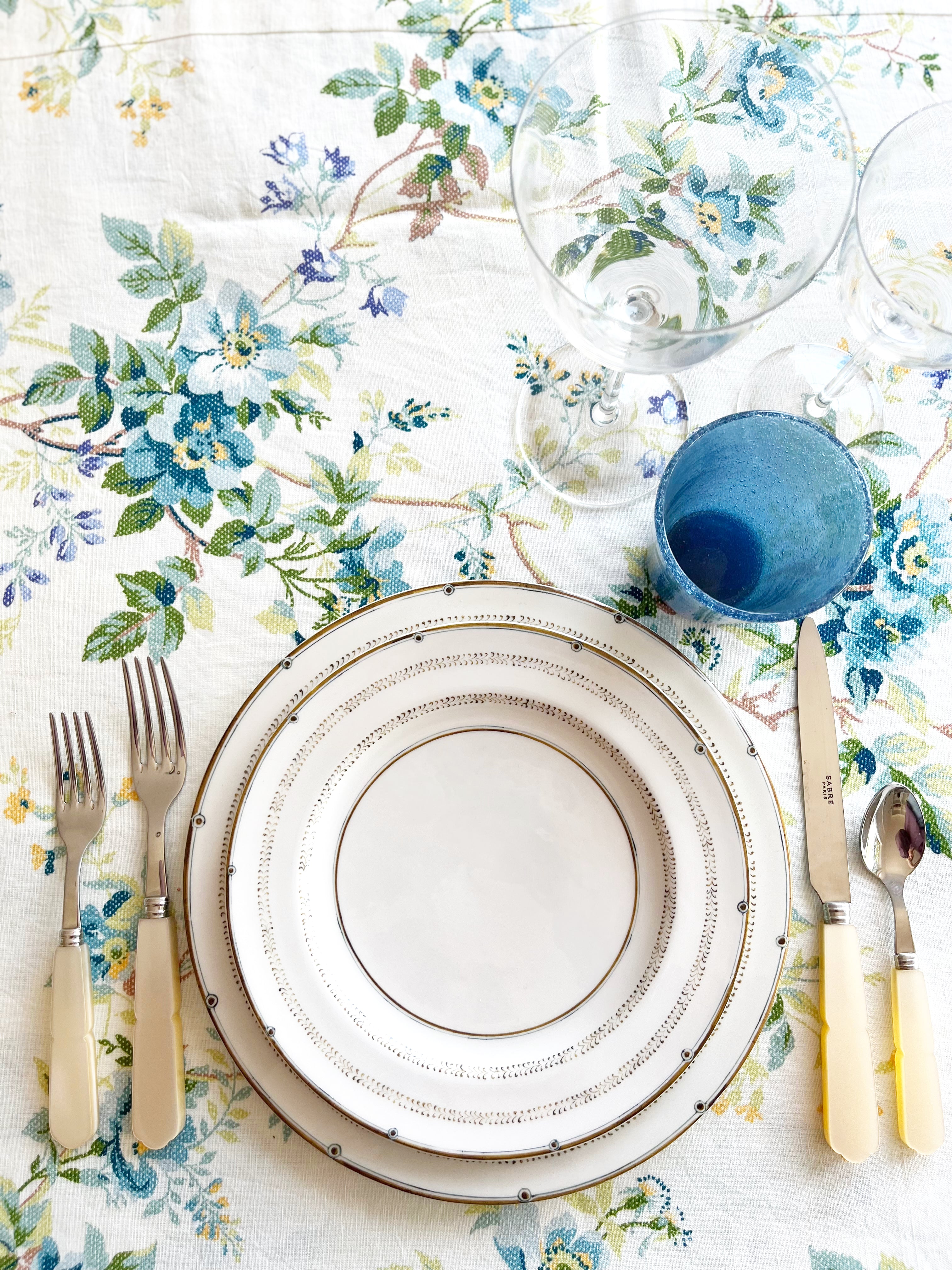 ceramic salad plate with narrow brown brush strokes around rim in tablescape