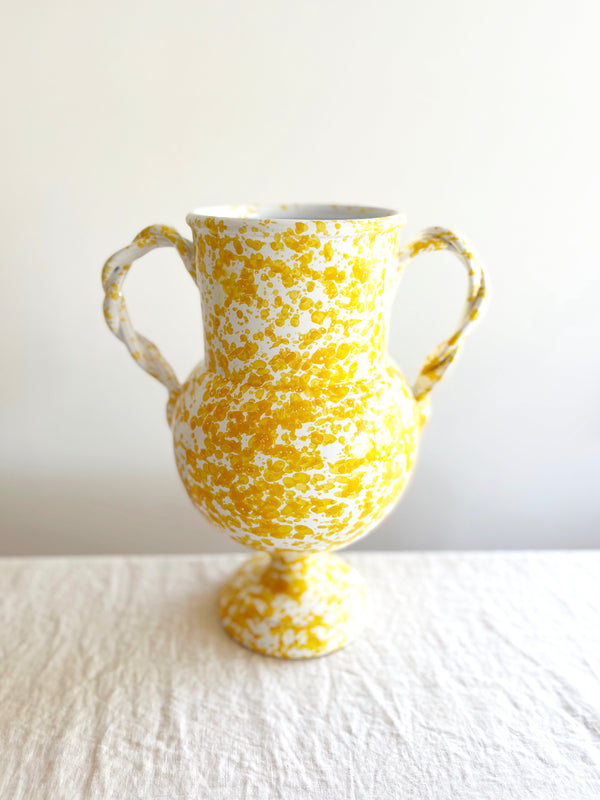 white amphora vase with yellow speckle pattern 13 inches tall