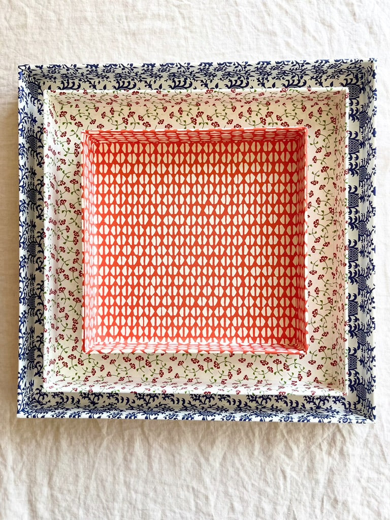 square red orange paper tray with white geometric print 8 inches nested in larger trays
