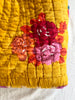 red and gold bedcover with red and pink bouquet on one side 86" by 106" floral detail view