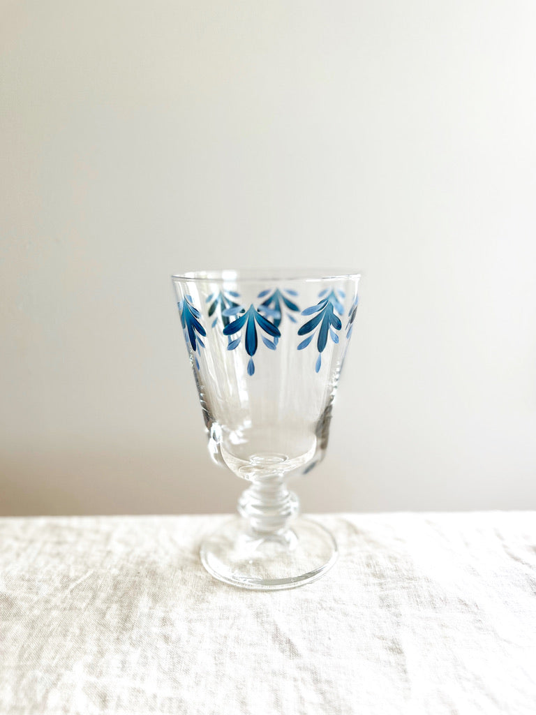 hand painted wine glasses with blue alternate leaf rim pattern