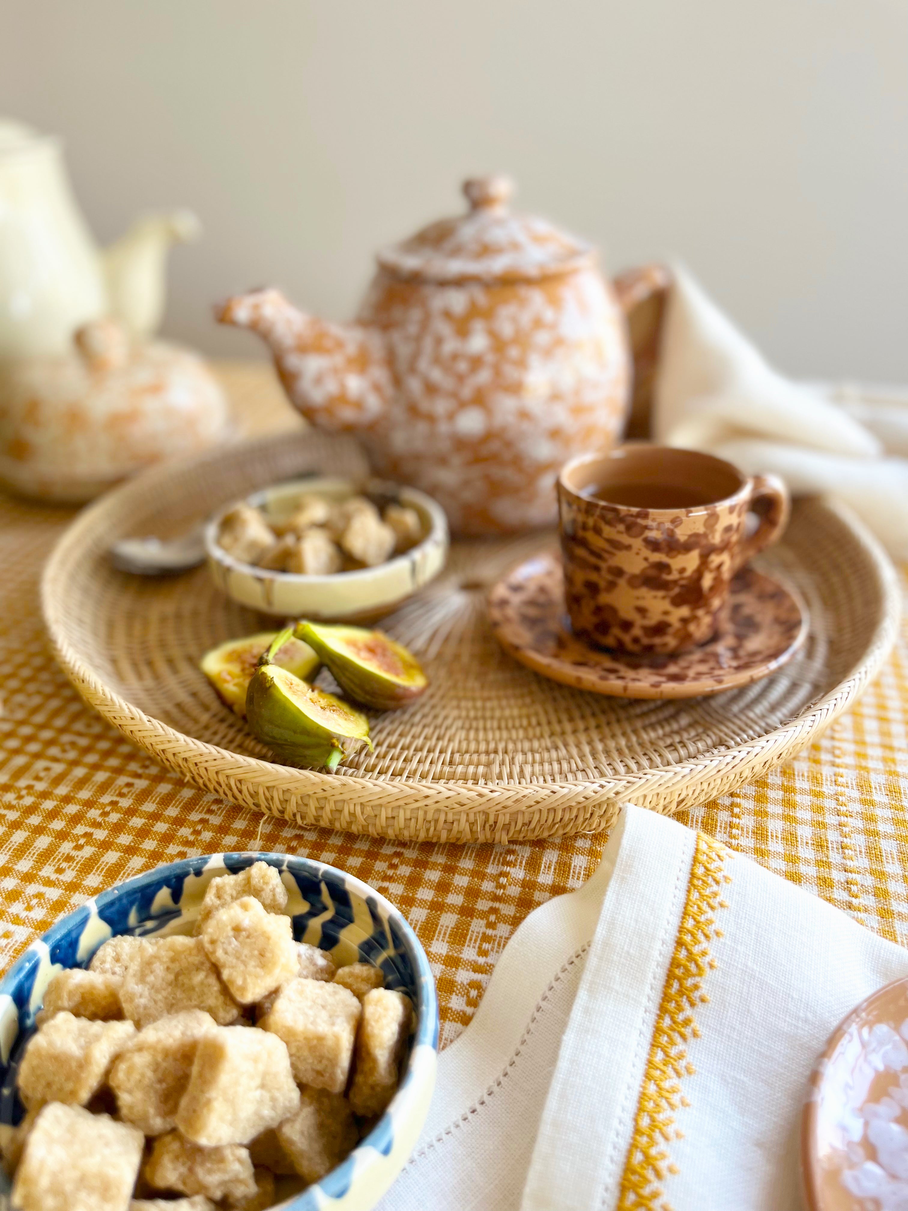 fasano espresso cup with brown splatter pattern with Pompeii Coffee Pot in sienna