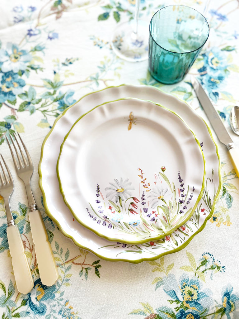 flower dinner plates with green edge in placesetting