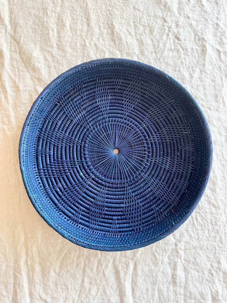 blue round woven tray fourteen inches