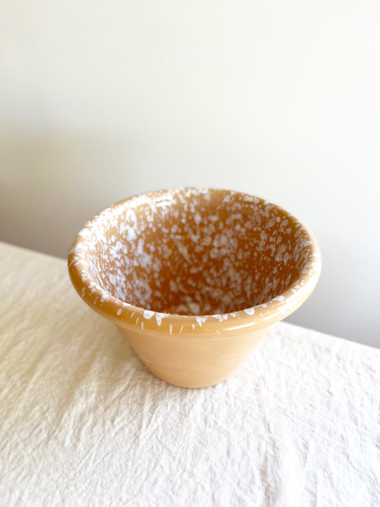 mixing bowls with splatter pattern in sienna color angle view from above