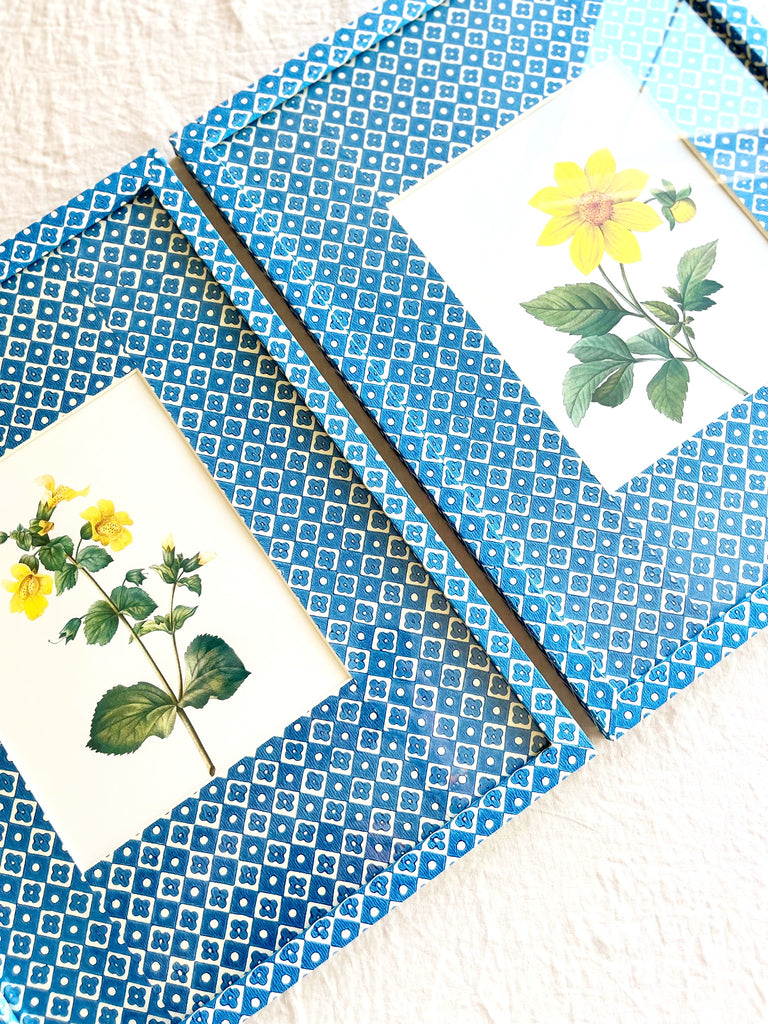 blue and white diamond print paper wrapped frame and mat with yellow botanical print 15" by 19" in group of two