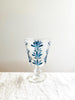 hand painted wine glasses with blue leaf pattern vertical line of flowers on side