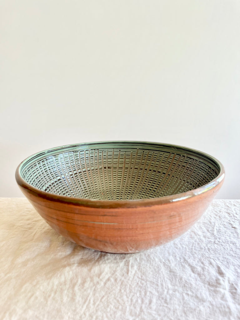 pasta bowl with peacock design in jade side view