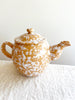 teapot with splatter pattern in sienna color detail