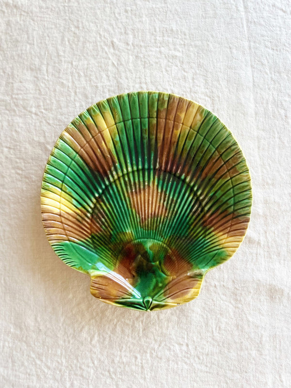 green and brown shell shaped majolica plate