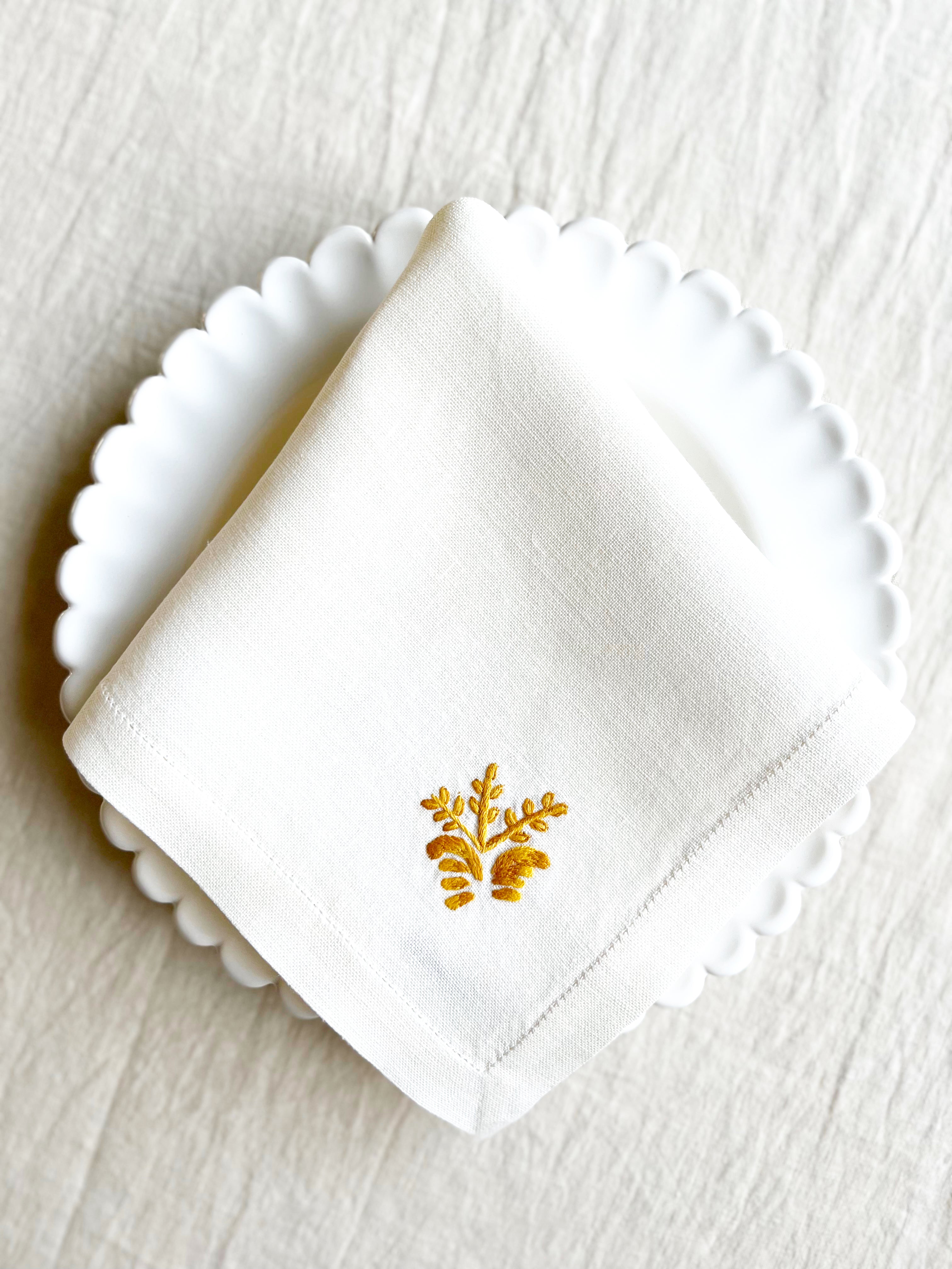 white hand embroidered linen napkins with gold corn stalk in corner 16 inches square