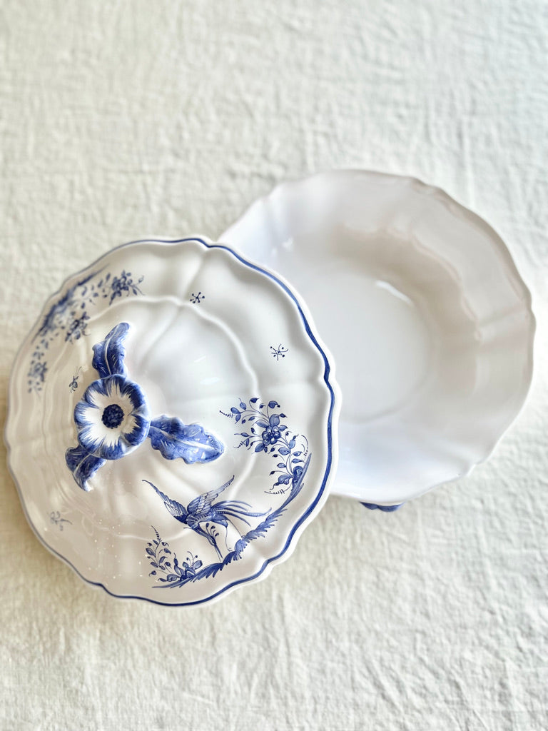white covered serving dish with blue phoenix design lid off