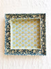square green paper tray with yellow sunflowers and white daisy print 8 inches nested with larger tray