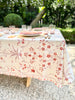 red and lilac floral print cotton tablecloth  on table