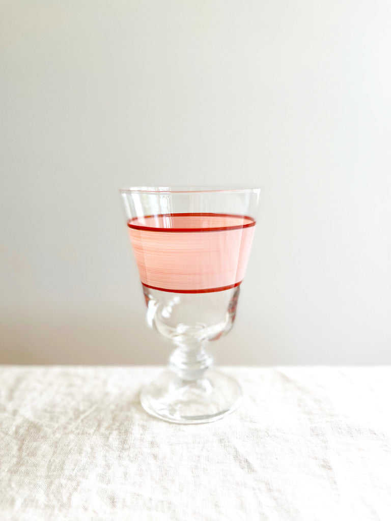 hand painted wine glass with peach and red stripe