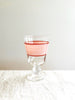 hand painted wine glass with peach and red stripe
