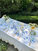 white serving tray with blue phoenix design in tablescape