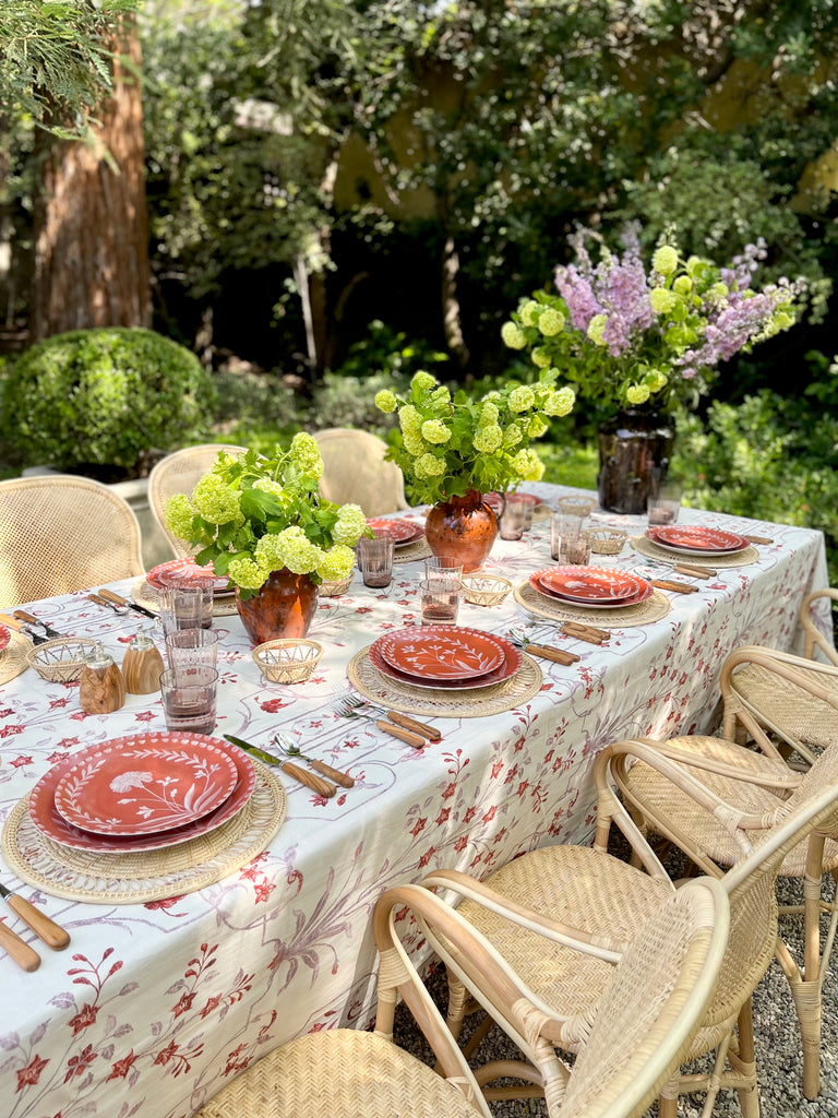 Porcelain Dinner Plate settings shown outside