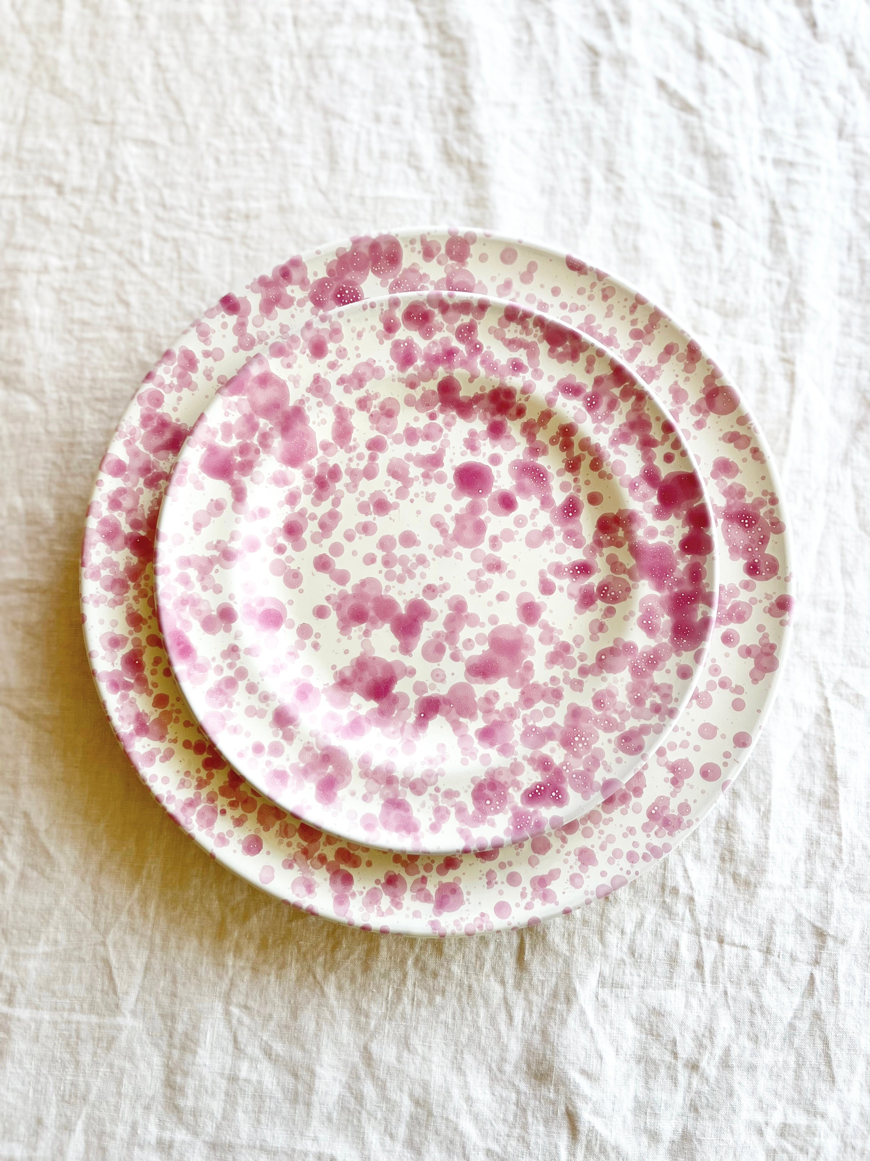 cream fasano salad plate with pink speckle pattern with dinner plate