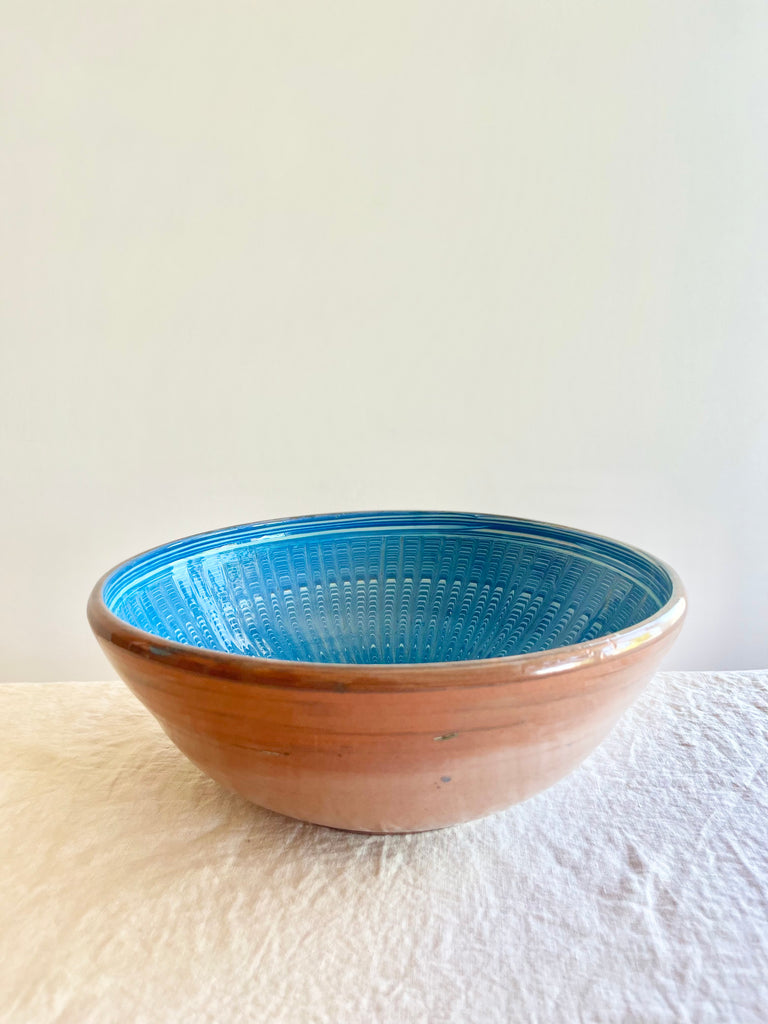 blue pasta bowl with peacock pattern on linen cloth twelve inch aegean