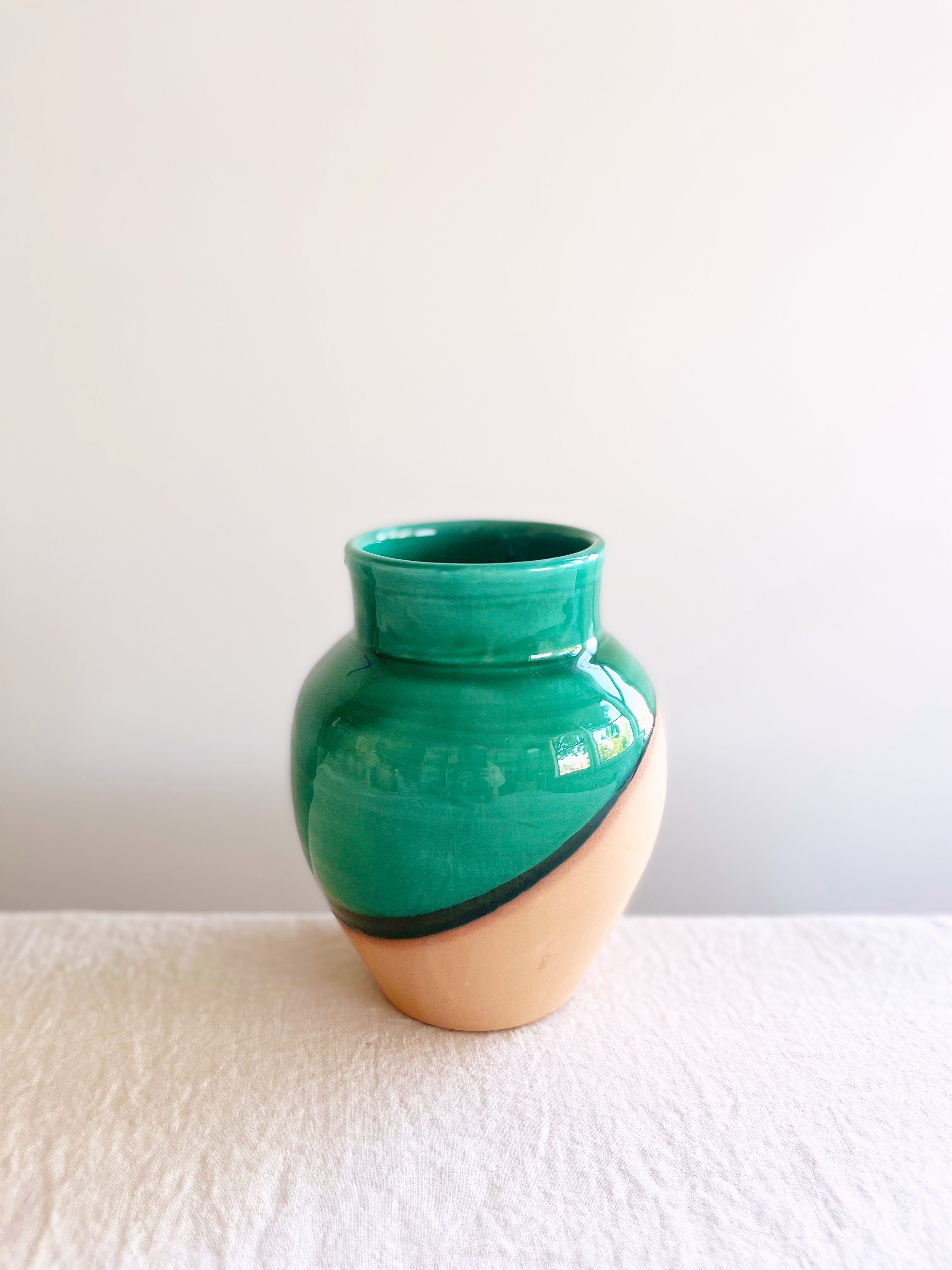 green black and cream pottery vase