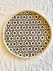 light tan woven tray with navy blue mosaic flower pattern 12 inches