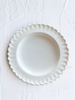 hand painted white dinner plate with scalloped edge