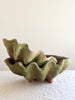 clam shell terra cotta planter with moss stack of two