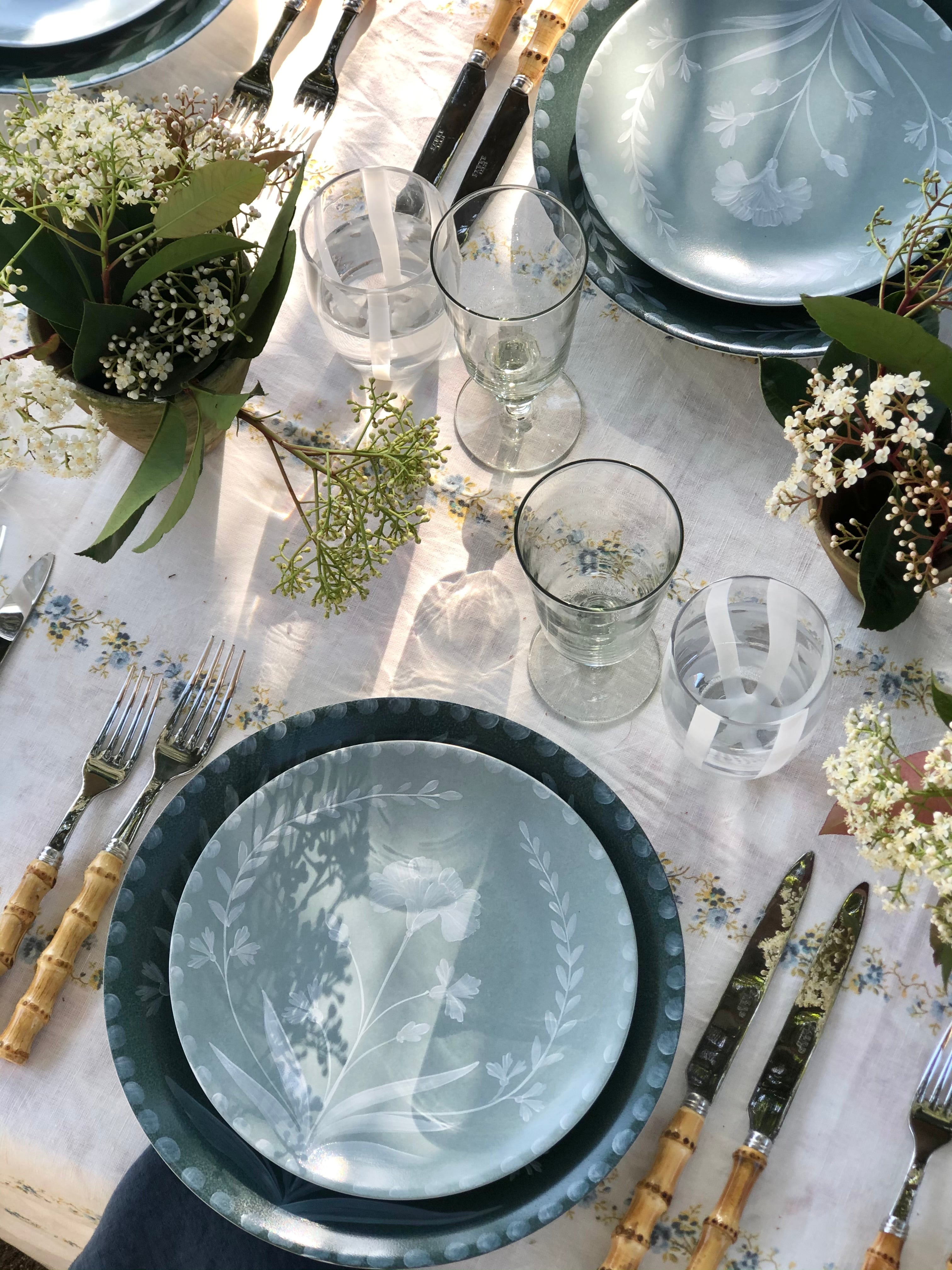 sabre stainless steel flatware set with natural bamboo handles in tablescape