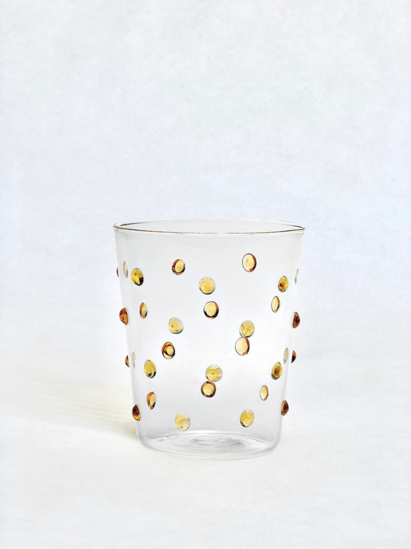 clear glass tumblers with yellow glass dots