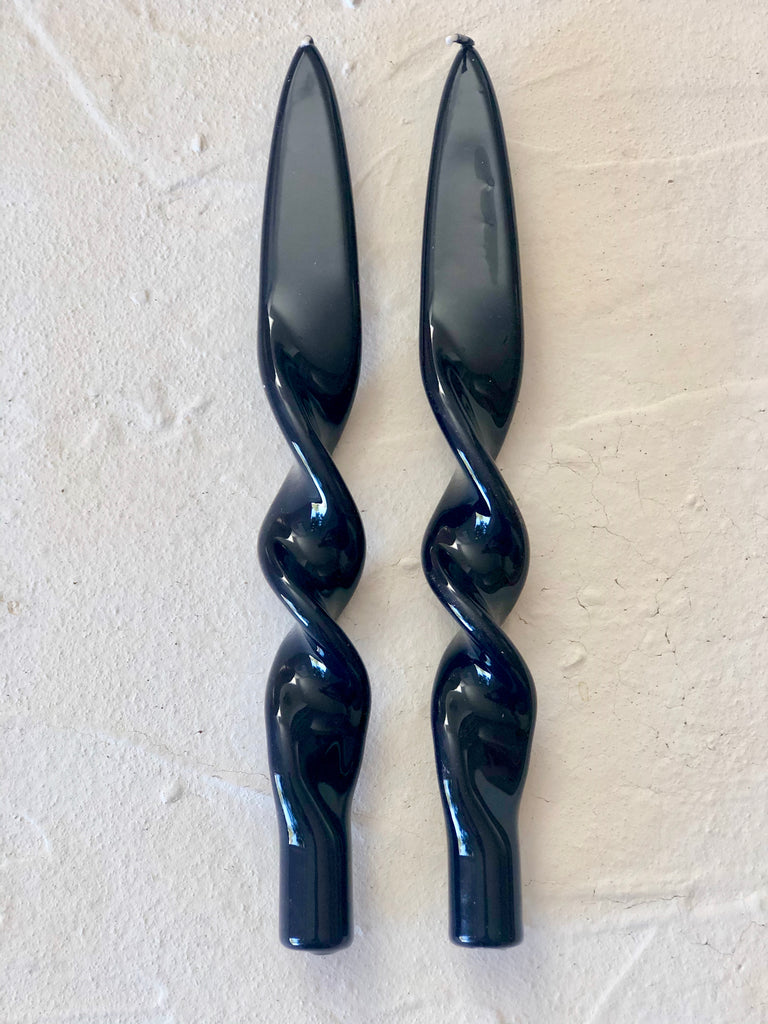 navy blue twisted taper candles 11 inches tall close up view