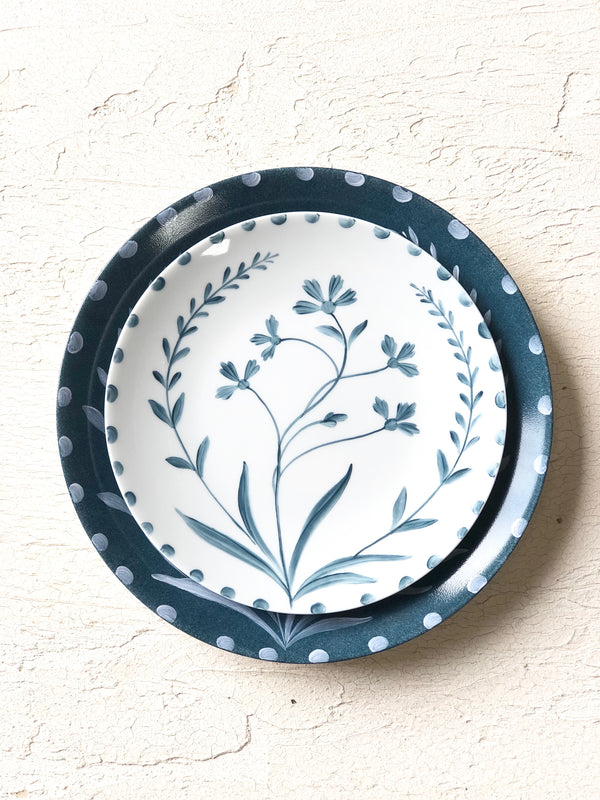 white salad plate with blue hand painted floral design 10.5 inch stacked with blue plate