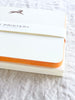 The Printery Derby Note Cards white with brown horse and orange edge 6.25 by 4.5 inches edge detail view