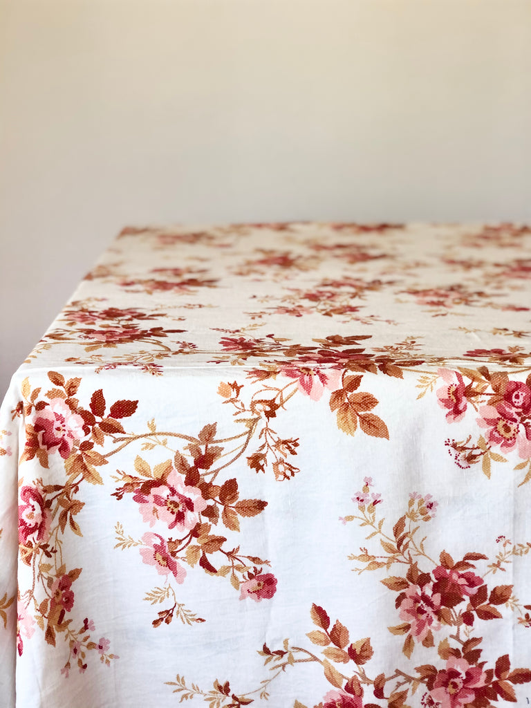 linen tablecloth with red climbing rose pattern