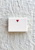 The Printery Heart Gift Enclosure Cards white with pink heart 3.5 wide by 2.5 high stacked on table