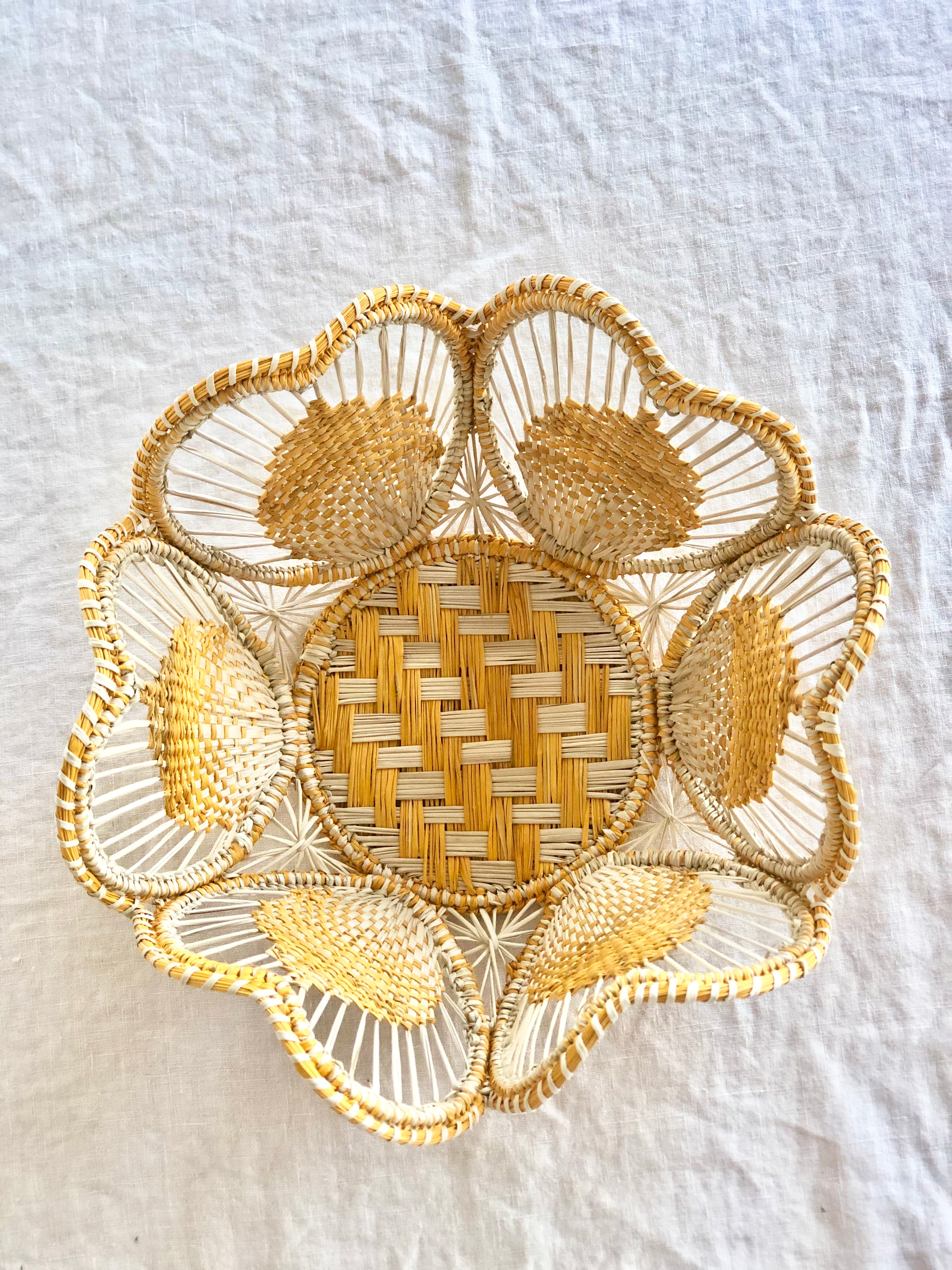 light brown and yellow round woven bread basket 8.5 inches in diameter top view