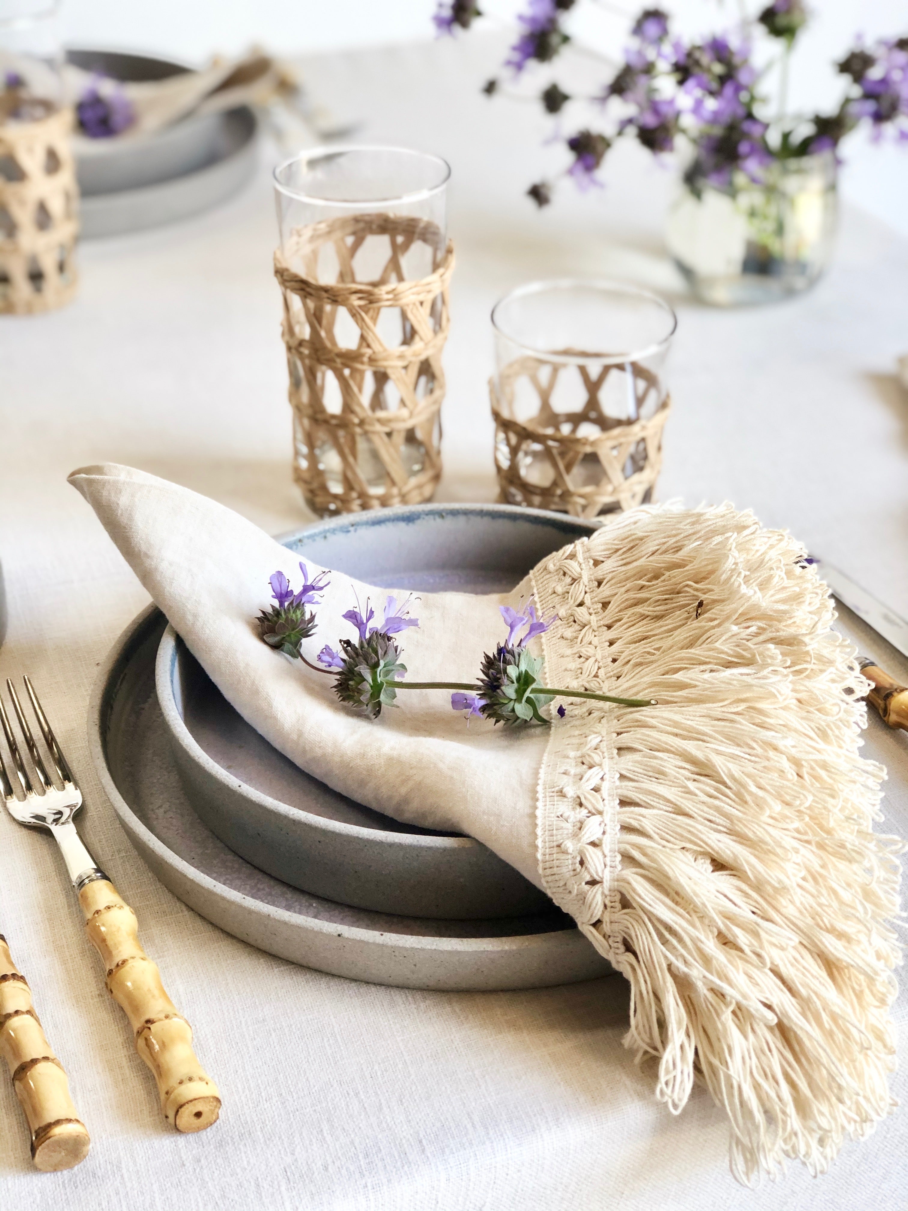 ivory linen napkins with fringe on placesetting