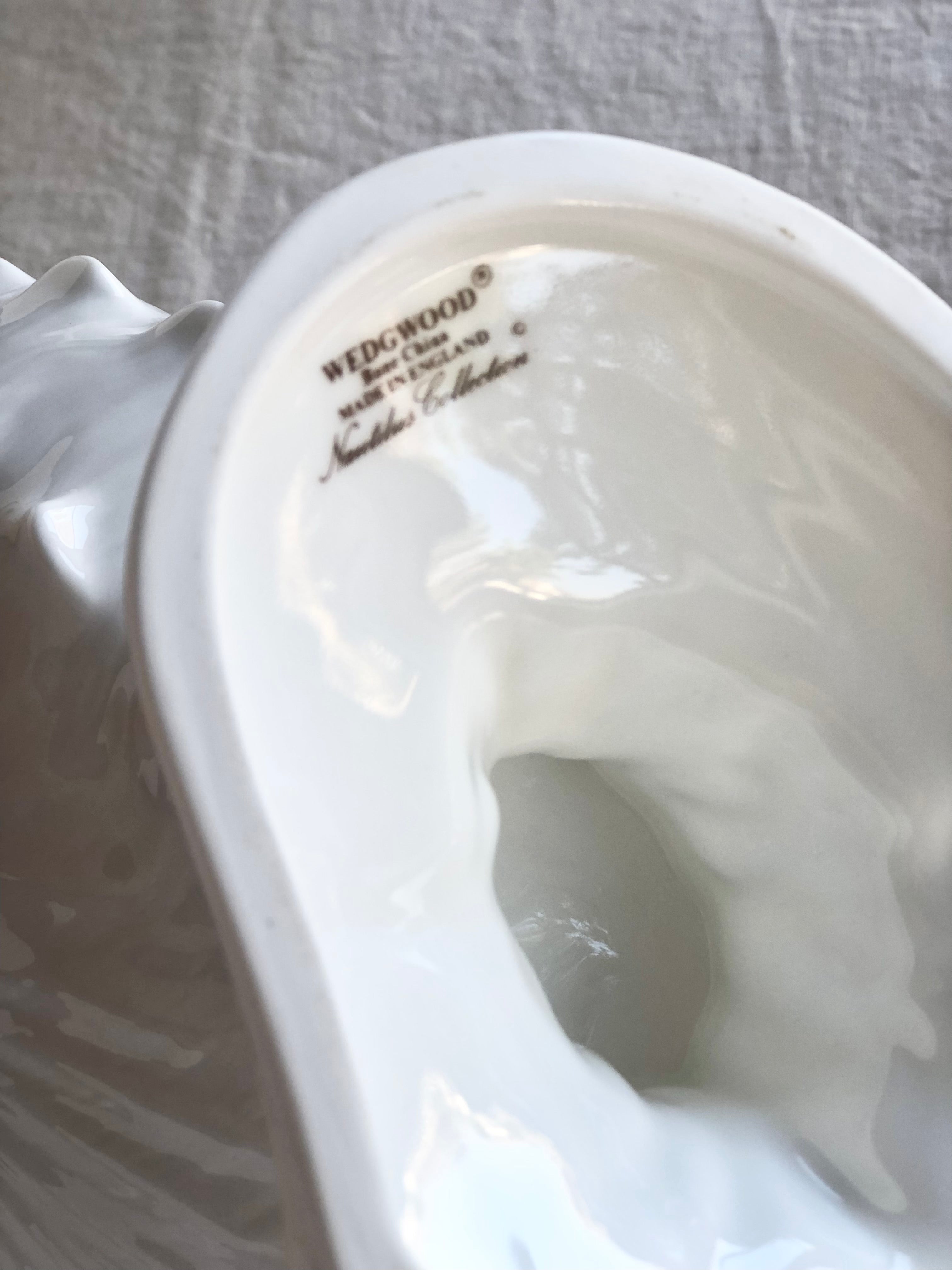vintage Wedgwood porcelain nautilus bowl with white interior wedgwood maker mark on bottom
