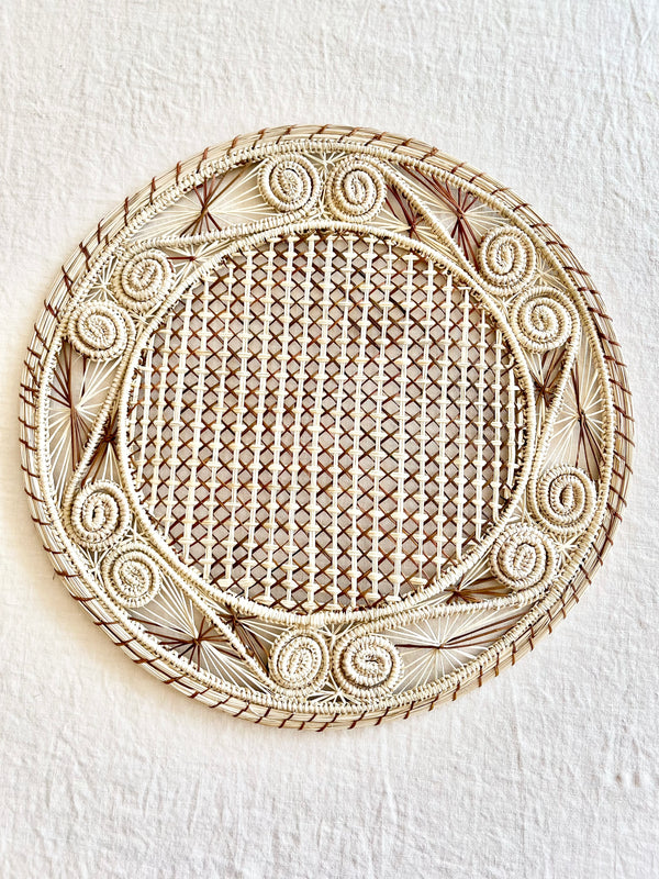 light brown woven charger made from seagrass 12.5 inches in diameter