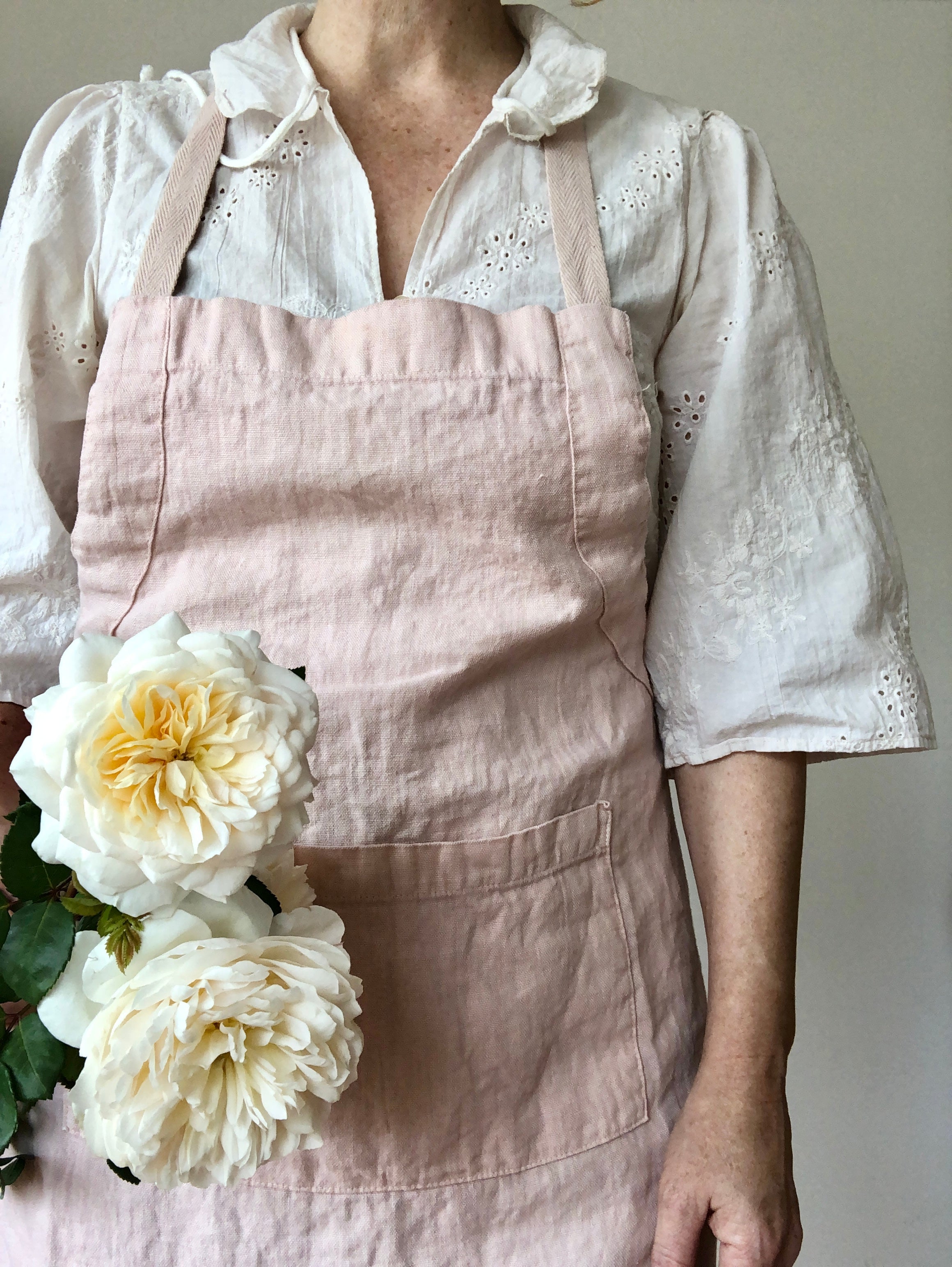 light pink linen apron full length pocket detail view