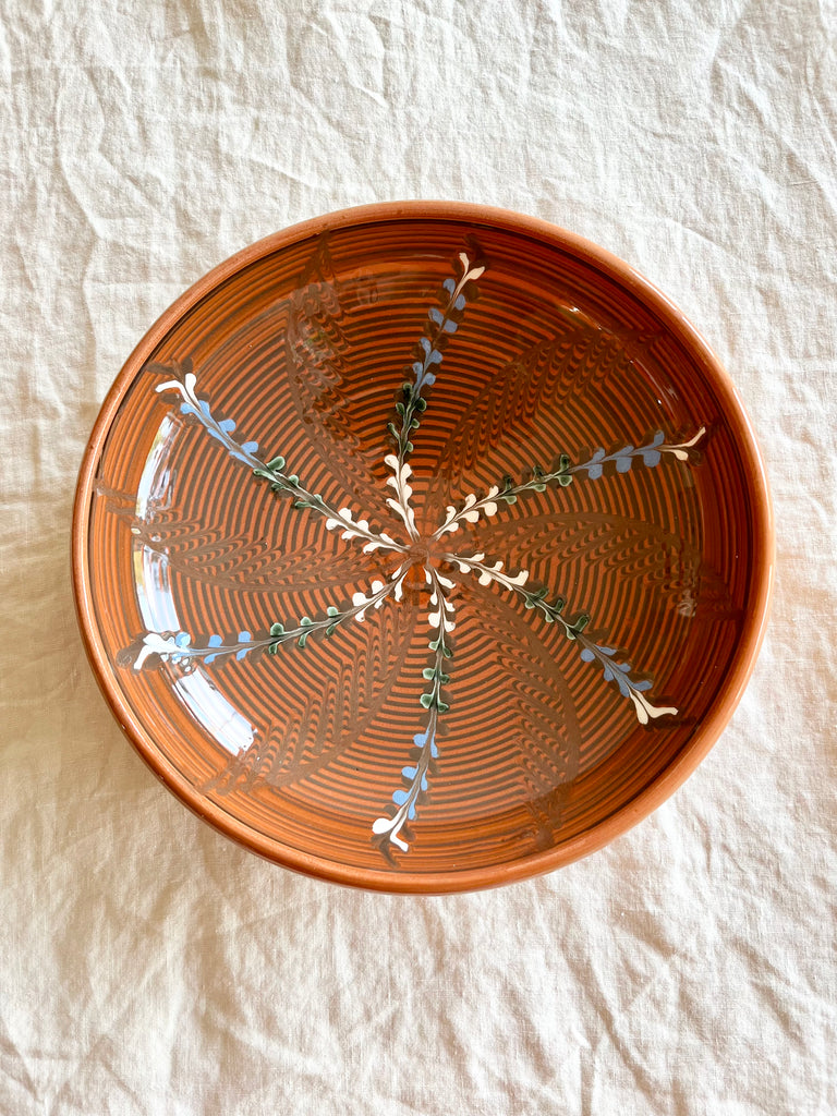 ceramic pasta bowl in henna with radial leaf design