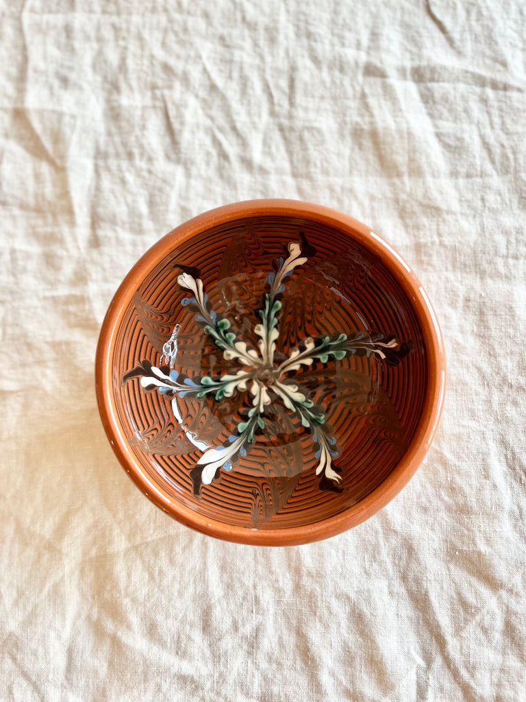 ceramic finger bowl in henna with radial leaf design
