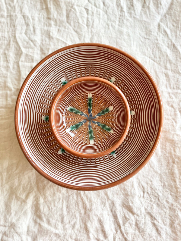 ceramic pasta bowl with radial leaf design in portocale color nested
