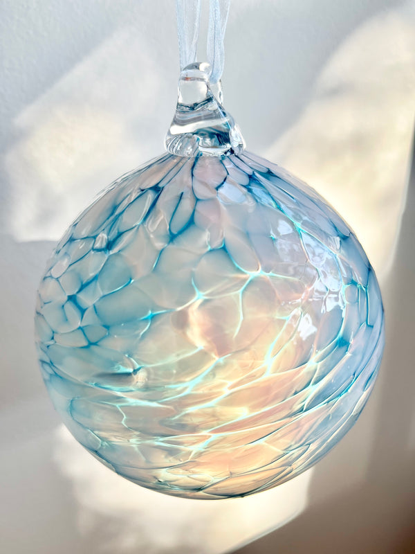 hand blown glass ornament blue and teal swirl pattern