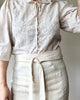 cream linen apron bistro style waist detail view