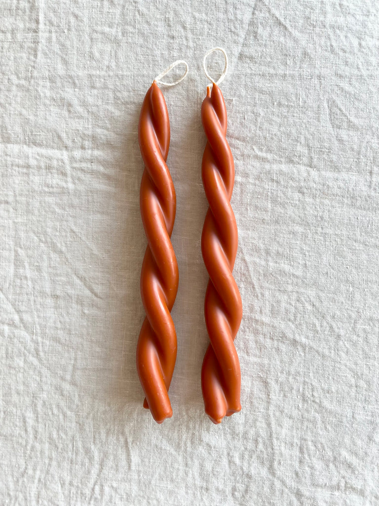 twisted candles by wax atelier in blood orange tapers