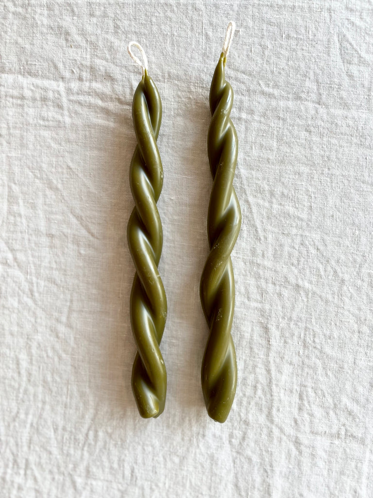 moss green twisted taper candles by wax atelier