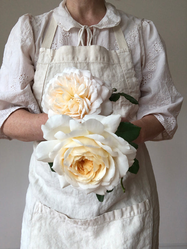 cream linen apron full length with flowers