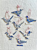 hand painted blue and white bird christmas ornament in group of seven
