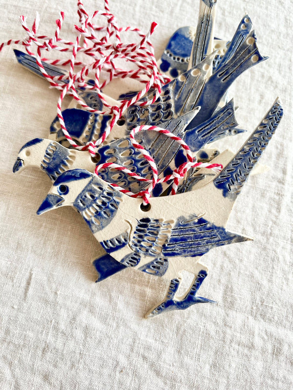hand painted blue and white bird christmas ornament bundled together